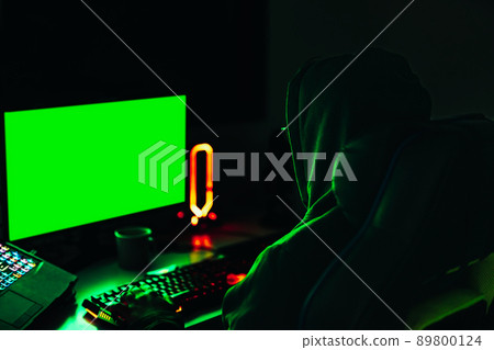 Hacker using computer to spy on financial data on government servers. cyber attack concept. 89800124