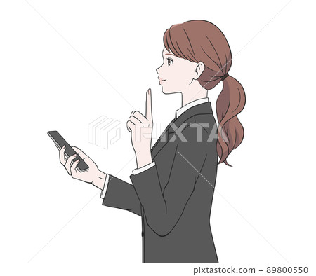 一個穿著西裝的女人拿著智能手機,用手指指著 一個穿著西裝的女人拿著智能手機,用手指指著 89800550