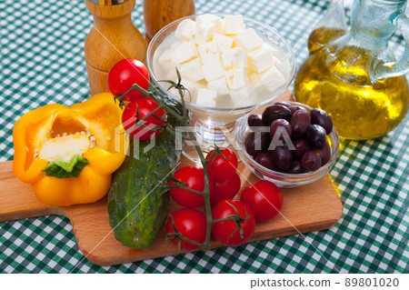 Traditional Greek fresh vegetable salad with feta cheese and herbs Traditional Greek fresh vegetable salad with feta cheese and herbs 89801020