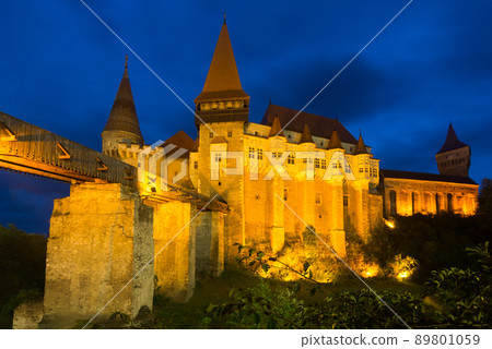 Night landscape with illuminated Corvin Castle, Romania Night landscape with illuminated Corvin Castle, Romania 89801059
