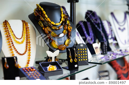 Amber jewelry in store window Amber jewelry in store window 89801497