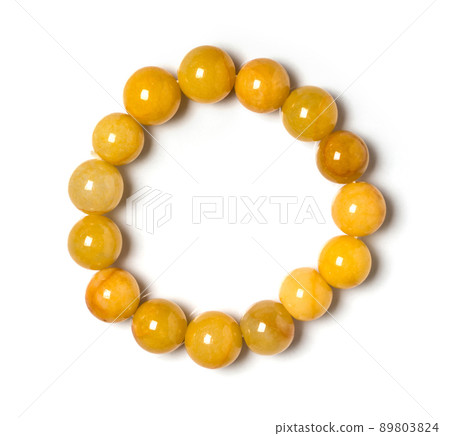 Honey Jade Jewel or gems bracelet on white background. Collection of natural gemstones accessories. Studio shot 89803824