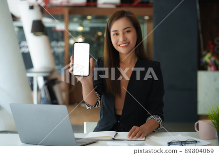 A businesswoman completes KYC using an online banking program in order to open a digital savings account. The definition of cyber security. A businesswoman completes KYC using an online banking program in order to open a digital savings account. The definition of cyber security. 89804069