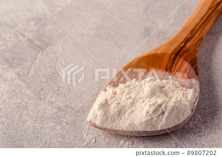 Ingredients for baking - spoon with flour Ingredients for baking - spoon with flour 89807202