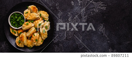 Dumplings, filled with mashed potatoes. 89807211