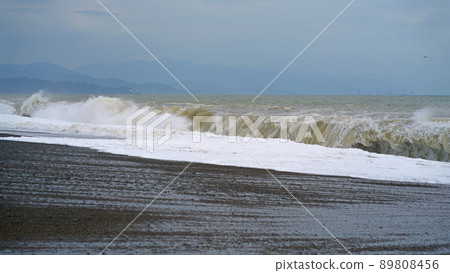 The Black Sea is stormy. Large sea wave. The sea is stormy. Cold stormy Black Sea coast, Georgia. The Black Sea is stormy. Large sea wave. The sea is stormy. Cold stormy Black Sea coast, Georgia. 89808456
