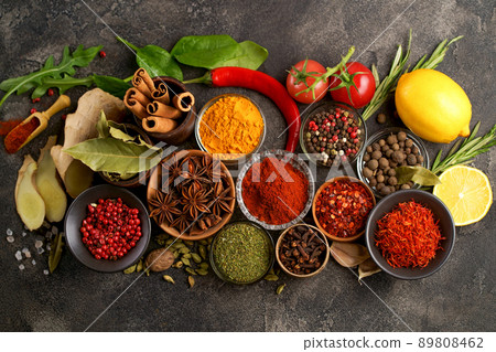 Various spices a vintage spoons on stone table. Colorful Herbal and Spices Oriental marketplace. Various spices a vintage spoons on stone table. Colorful Herbal and Spices Oriental marketplace. 89808462