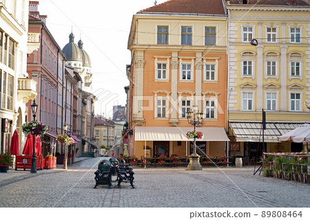 Traditional houses on a pedestrian street in the historic Old Town of Lviv, Ukraine. May 2021 89808464