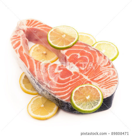 Sliced piece of fish. Steak of red fish on white background Sliced piece of fish. Steak of red fish on white background 89808471