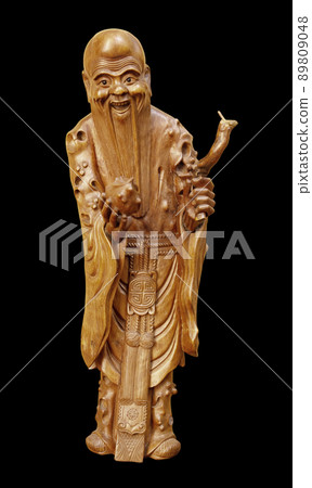 Wood statue of japan lucky god, God of prolonging life longevity Fukurokuju isolated on black background 89809048