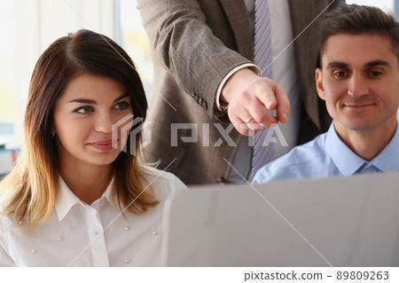 Team work on desktop computer, boss point on screen, this one, perfect choice 89809263