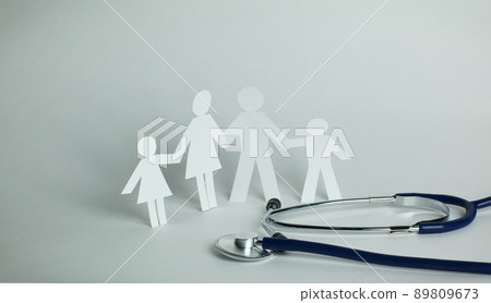 stethoscope and the family paper doll.the concept of health. 89809673