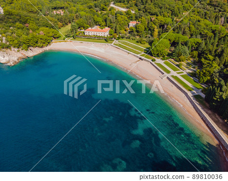 Queen's Beach in Milocer, Montenegro. Aerial view of sea waves and fantastic Rocky coast, Montenegro 89810036