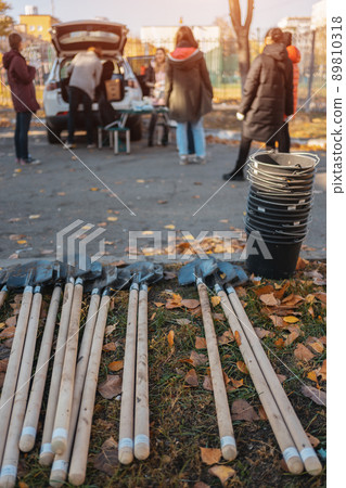 people preparing planting trees outdoor with shovel and bucket or gardening tool people preparing planting trees outdoor with shovel and bucket or gardening tool 89810318