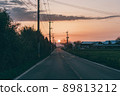Sunset country road 89813212