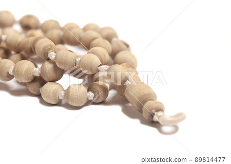 Rosary or prayer beads isolated on white background Rosary or prayer beads isolated on white background 89814477
