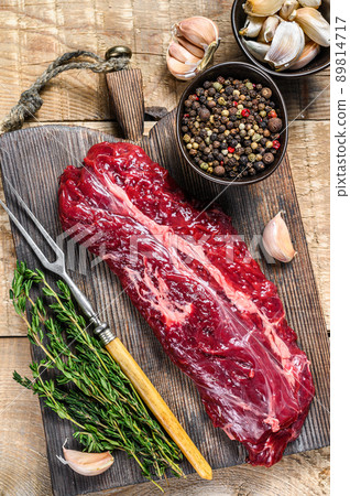 Butchers choice steak Onglet Hanging Tender beef meat. wooden background. Top view 89814717