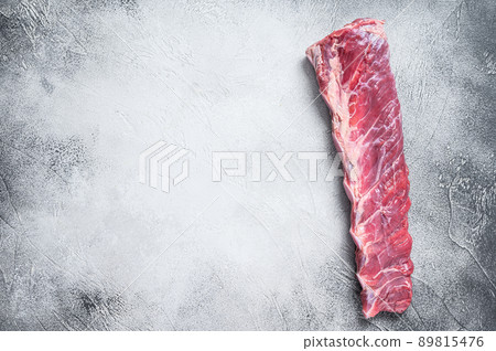 Raw veal calf short spare rib meat. White background. Top view. Copy space Raw veal calf short spare rib meat. White background. Top view. Copy space 89815476