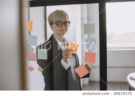 Manager working in the office. Lady in glasses. Woman in her office. Manager working in the office. Lady in glasses. Woman in her office. 89816579