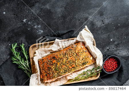 Hot smoked salmon fillet. trout. Black background, top view, space for text 89817464