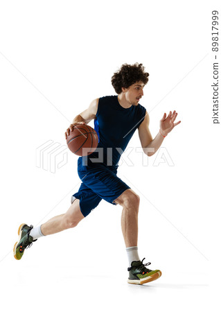 Young muscular basketball player in action, motion isolated on white background. Concept of sport, movement, energy and dynamic, healthy lifestyle. Young muscular basketball player in action, motion isolated on white background. Concept of sport, movement, energy and dynamic, healthy lifestyle. 89817999