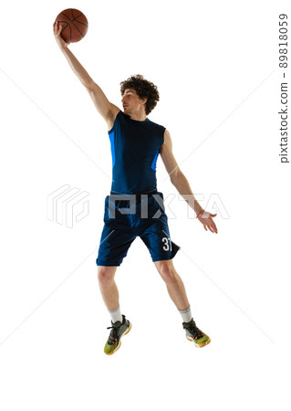One sportive basketball player training with ball isolated on white background. Concept of sport, competition, achievements, game. 89818059