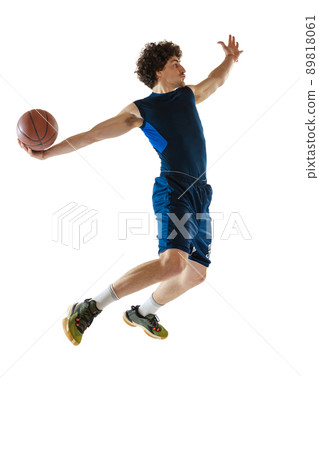 Dynamic portrait of young man, basketball player playing basketball isolated on white background. Concept of sport, movement, energy and action 89818061
