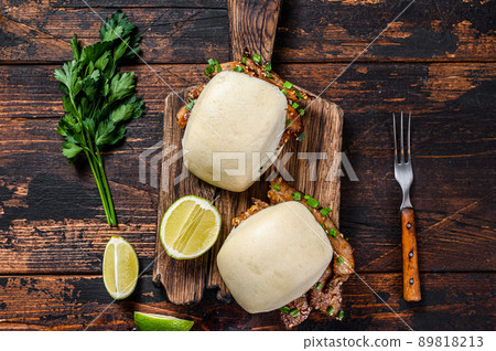 Chinese sandwich steamed gua bao buns with pork. Black background. Top view 89818213