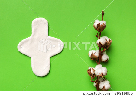 set of colorful bright reusable menstrual pads with cotton flower. zero waste woman periods concept top view with copy space set of colorful bright reusable menstrual pads with cotton flower. zero waste woman periods concept top view with copy space 89819990