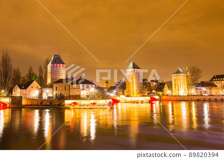 Ponts Couverts Bridge illuminated at night in Strasbourg, France Ponts Couverts Bridge illuminated at night in Strasbourg, France 89820394