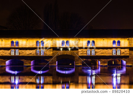 Barrage Vauban illuminated at night in Strasbourg, France 89820410