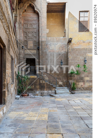 Courtyard of Prince Tax palace with staircase and entrance leading to the first floor Courtyard of Prince Tax palace with staircase and entrance leading to the first floor 89820974