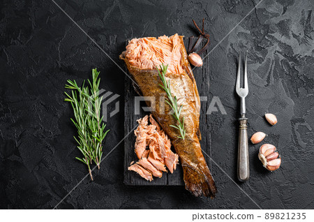 Salmon Hot smoked, trout fish meat. Black background. Top view Salmon Hot smoked, trout fish meat. Black background. Top view 89821235