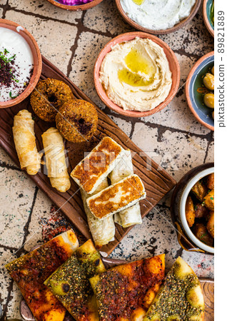 Fried cheese and falafel with sause in Turkish Village Breakfast. Top view Fried cheese and falafel with sause in Turkish Village Breakfast. Top view 89821889