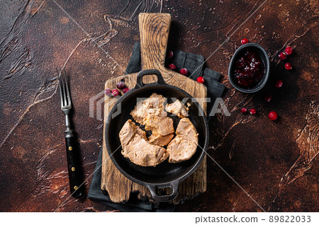Franch Foie gras duck liver pate with lingonberry marmalade. Dark background. Top view 89822033