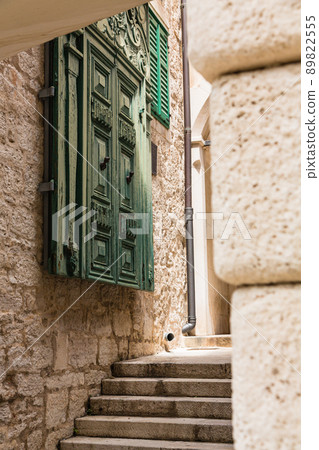 Door of a private house in the back alley of the old town of Sibenik, Croatia Door of a private house in the back alley of the old town of Sibenik, Croatia 89822555