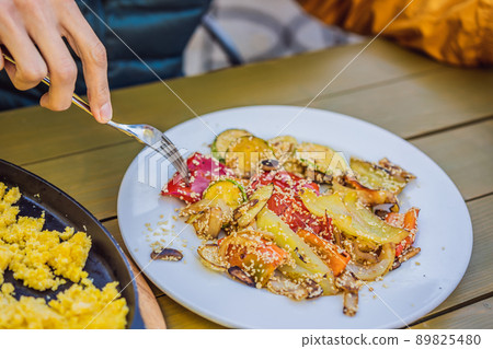 Grilled colorful vegetable : bell pepper, zucchini, eggplant on a plate over light grey slate, stone or concrete background Grilled colorful vegetable : bell pepper, zucchini, eggplant on a plate over light grey slate, stone or concrete background 89825480