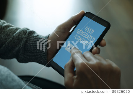 smartphone with the text user generated content 89826030