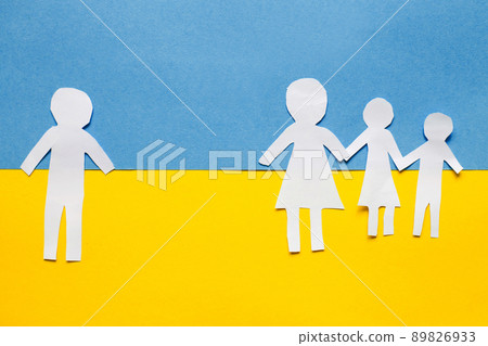 paper cut divided family on the background of the ukrainian flag. stop war concept 89826933