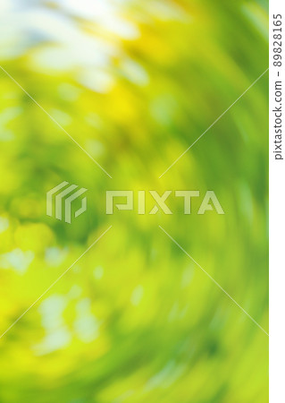 Abstract green bokeh background. Summer sunlight natural bokeh. Abstract green bokeh background. Summer sunlight natural bokeh. 89828165