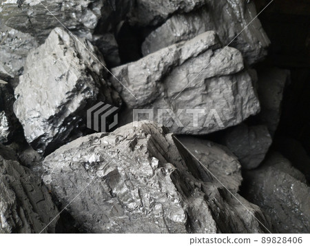 Coal industry. Chunks of black coal close-up. Fuel harvesting 89828406
