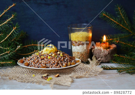 Vintage bowl with traditional kutia with poppy seed. Vintage bowl with traditional kutia with poppy seed. 89828772