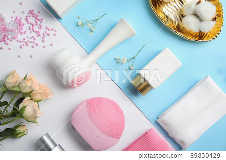 Flat lay composition with face cleansing brush on color background. Cosmetic accessory Flat lay composition with face cleansing brush on color background. Cosmetic accessory 89830429
