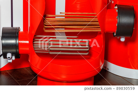 Heating elements in an industrial electric boiler in red. 89830559