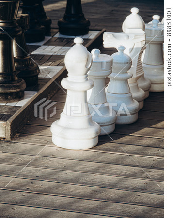 Detail gigantic chess outdoors on a sunny day. 89831001