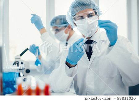 background image of a laboratory assistant in a medical laboratory 89831020