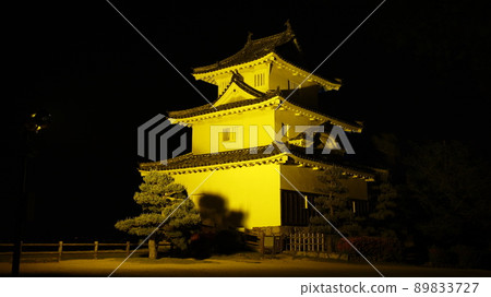 Marugame Castle castle tower illuminated in the color of the Ukrainian flag, only the yellow illumination can be seen when shooting at the main enclosure 89833727