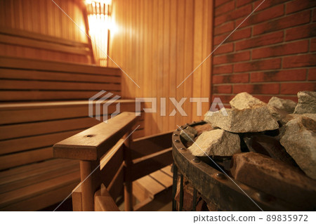 Interior of a modern wood-fired sauna. Steam room. 89835972