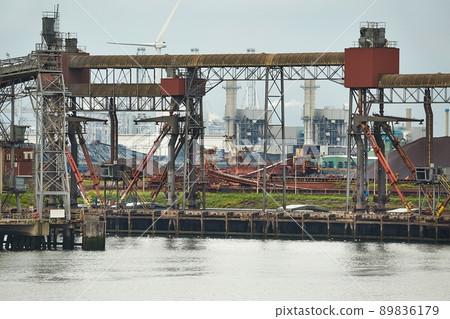 Industrial harbor with rusty structures 89836179