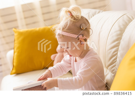 Cochlear implant for baby. Deaf child with hearing aid. Health care and medicine technology and innovations and diversity Cochlear implant for baby. Deaf child with hearing aid. Health care and medicine technology and innovations and diversity 89836415